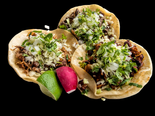 Three tacos with toppings