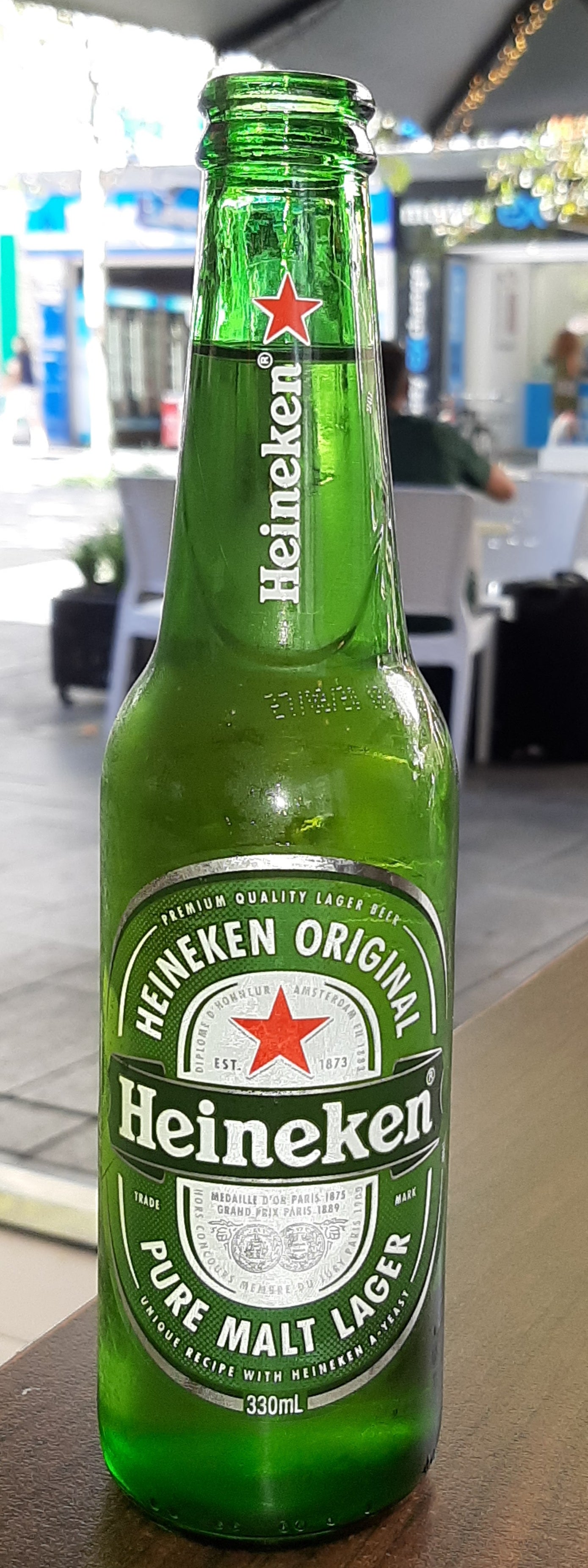 330 ml green bottle of Heineken Original lager