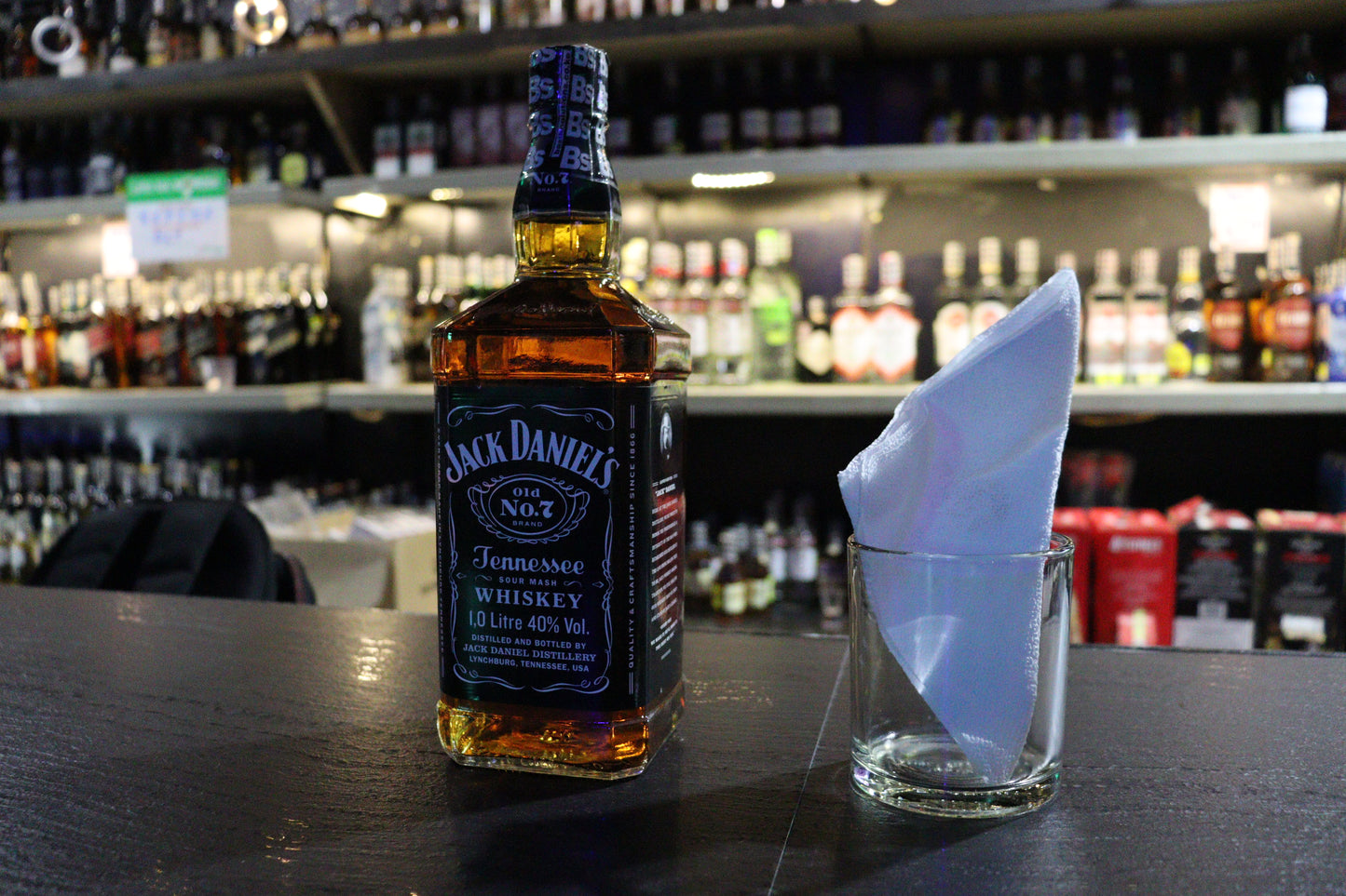 1 litre bottle of Jack Daniel's Old No. 7 Tennessee whiskey on a bar counter