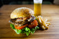 Fast food feast: burger, fries and fried chicken