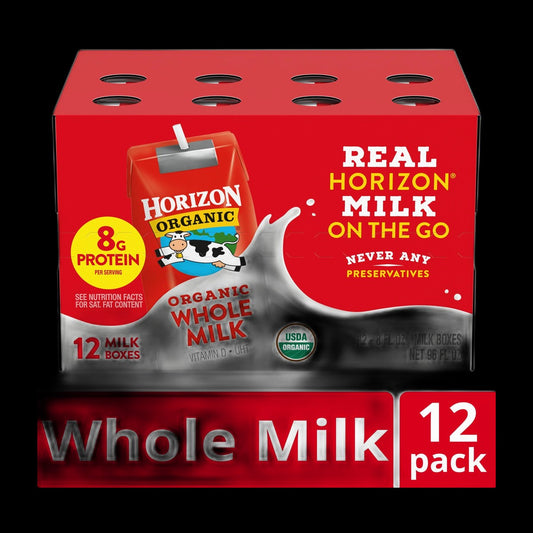UHT milk boxes on black background