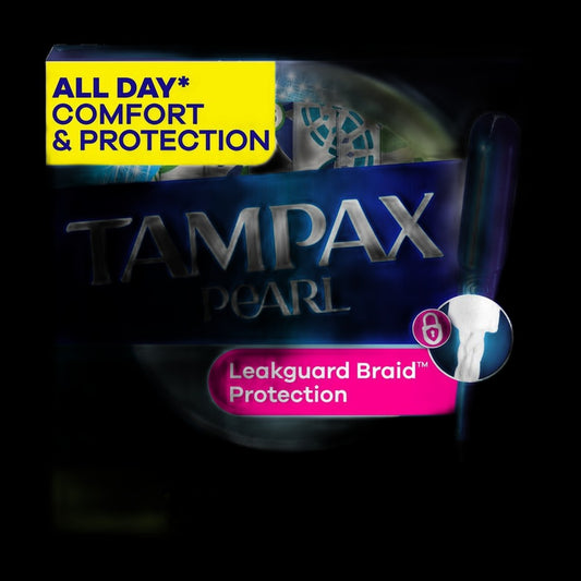 Tampons box on black background