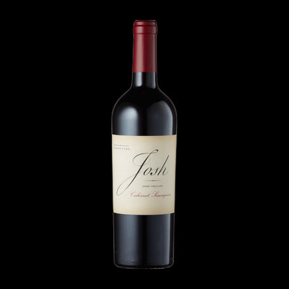 Cabernet Sauvignon red wine bottle on black background