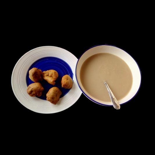 Hausa koko and bofrot on black background