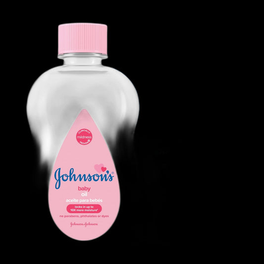 Baby oil bottle on black background
