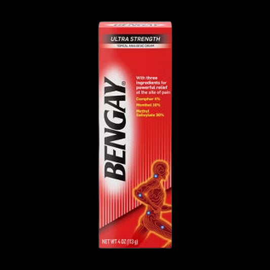 Pain relief balm on black background