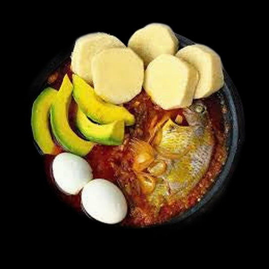 Ampesi with garden egg stew on black background
