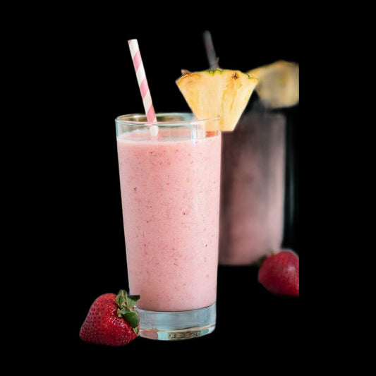 Tropical fruit milkshake on black background