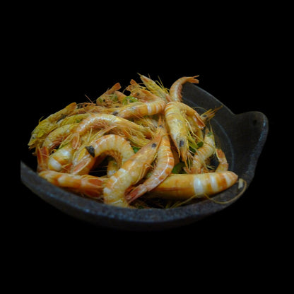 Dynamite shrimps on black background