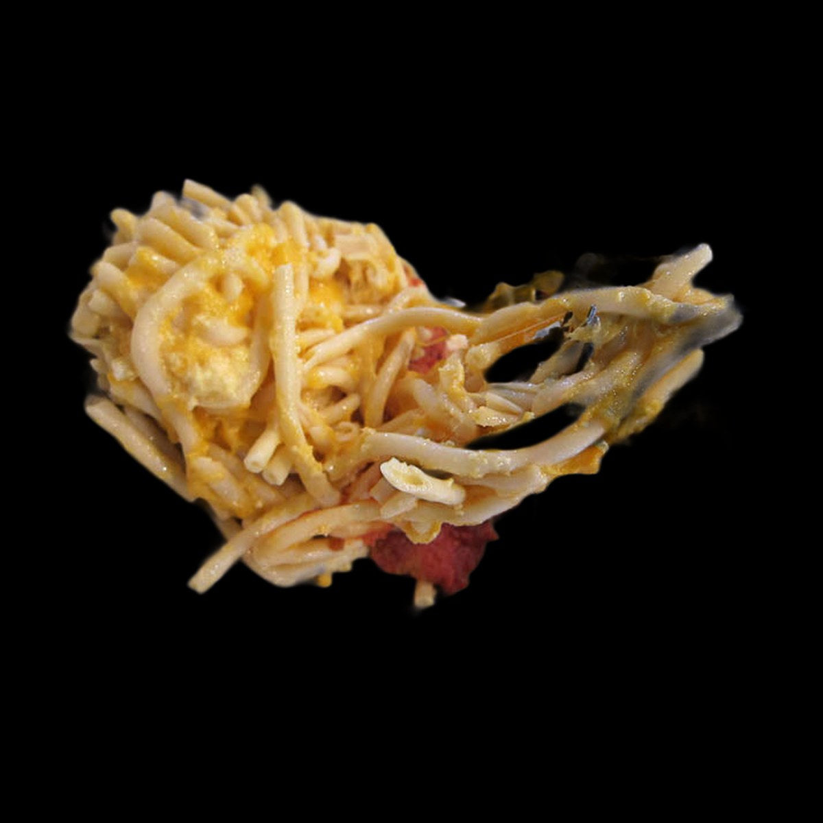 Shrimp mac and cheese on black background