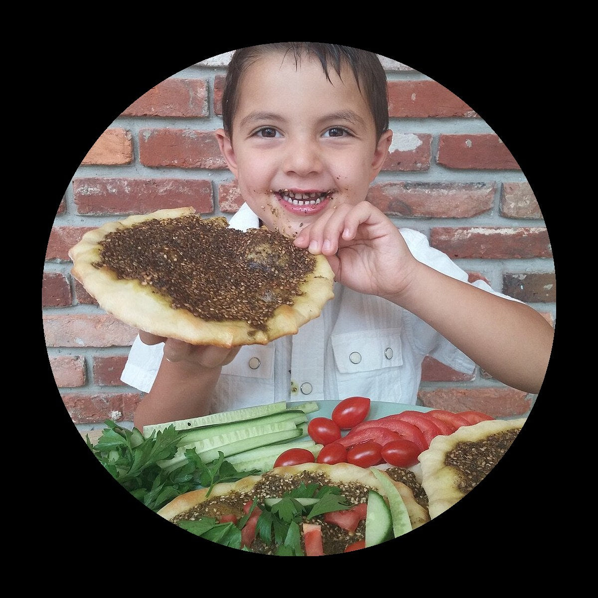 Zaatar manakish flatbread on black background