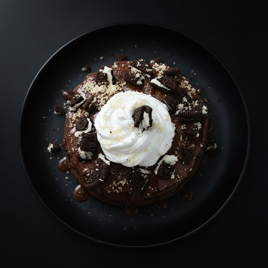 Oreo pancakes on black background