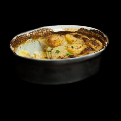 Yam gratin on black background