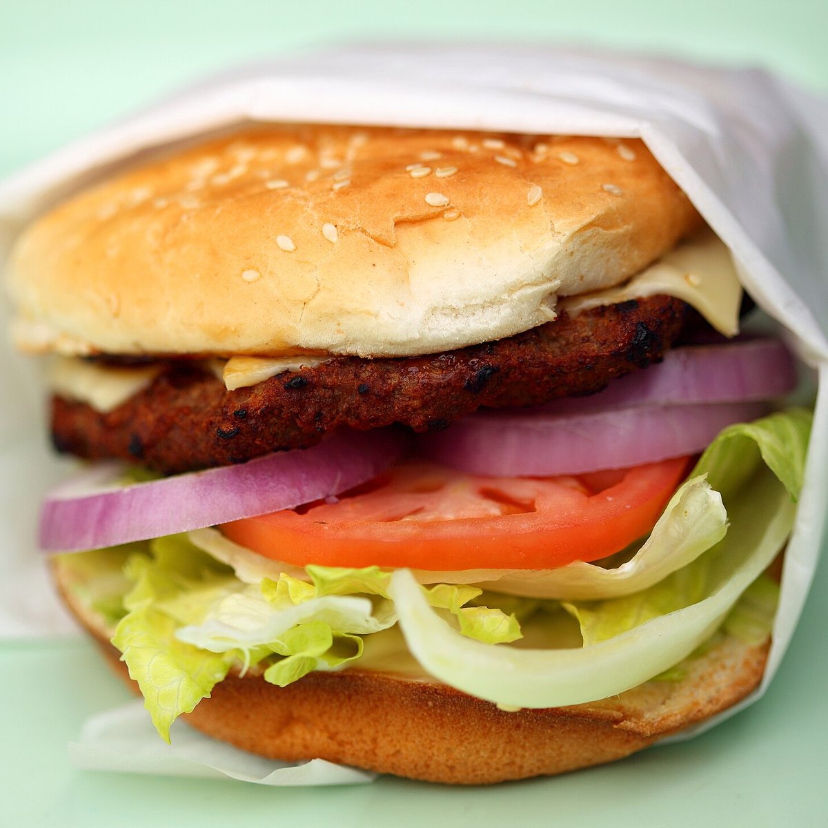 Classic beef burger with lettuce, tomato and onion