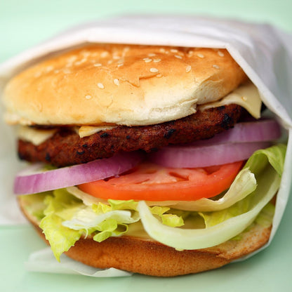 Classic beef burger with lettuce, tomato and onion