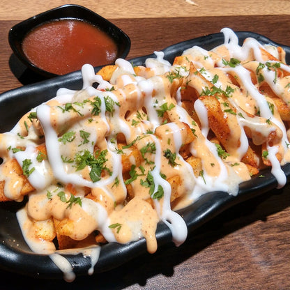 Loaded fries with crispy chicken and melted cheese