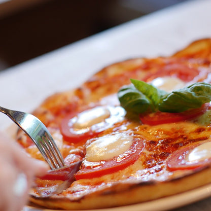 Margherita pizza with mozzarella and basil