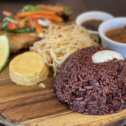 Waakye with egg, spaghetti and shito